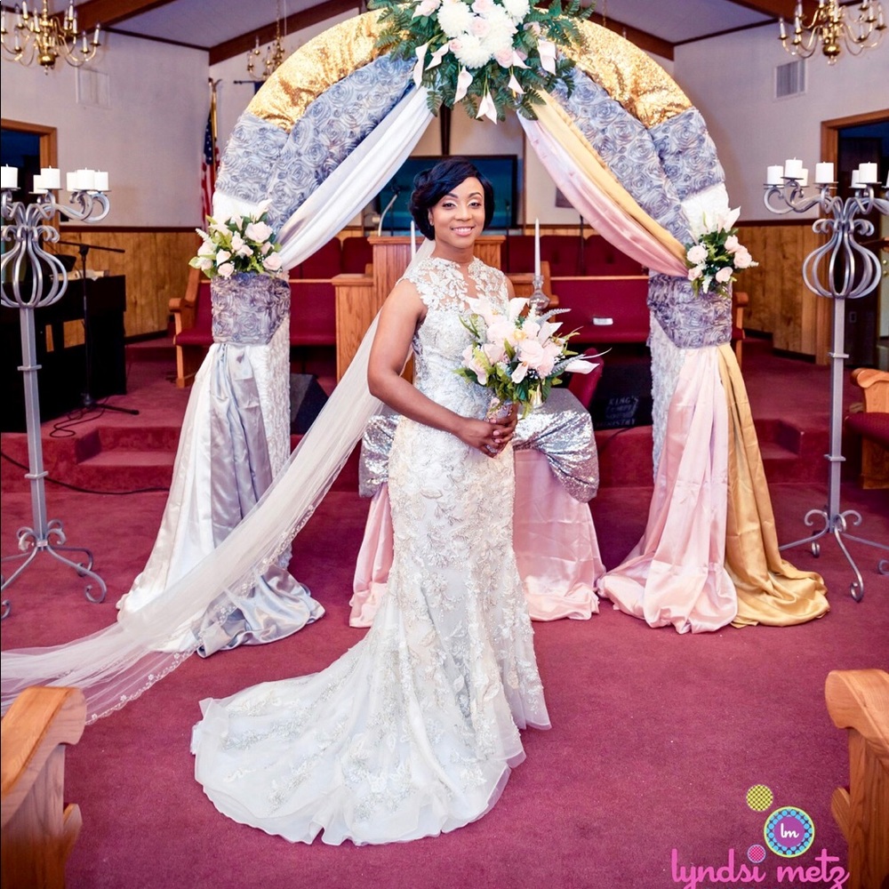 Stephen Yearick white Form fitting wedding gown.